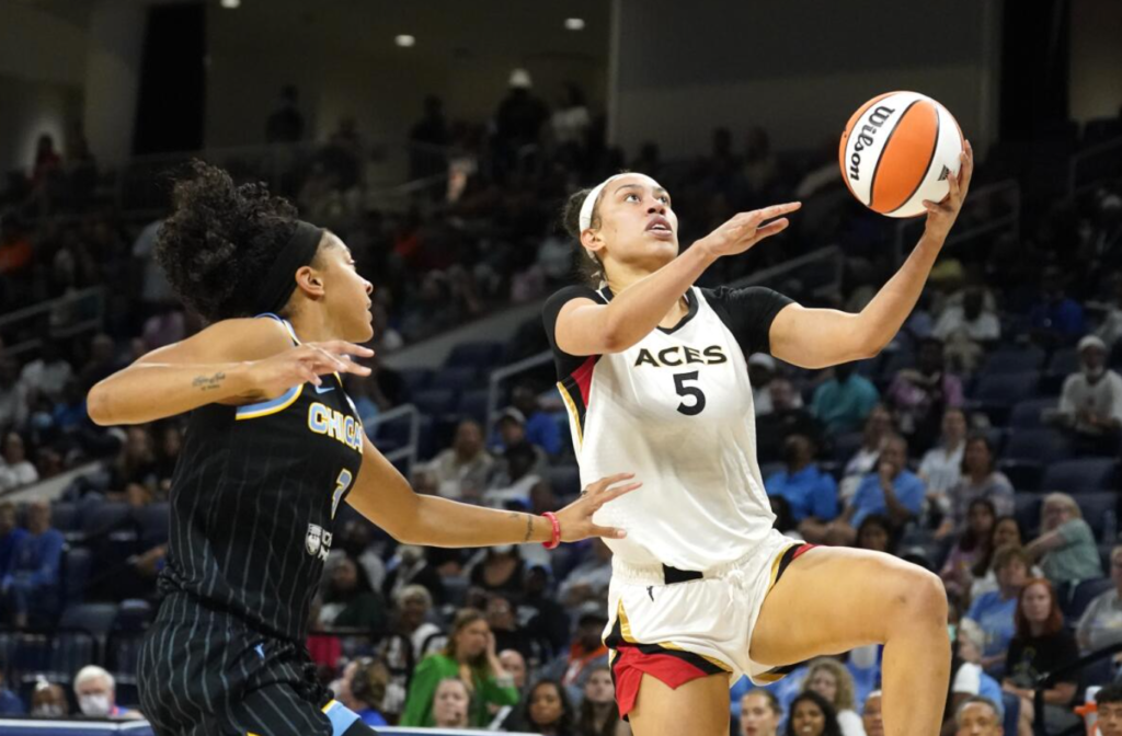 Dearica Hamby playing basketball